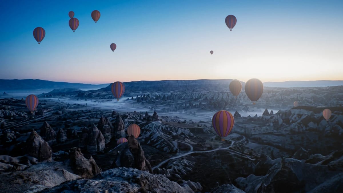 Balloons: hot-air balloons over a dawn valley — screenshot of the Halofloor music visualizer