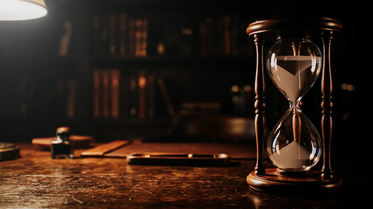 Hourglass: an hourglass on a desk in the dark — screenshot of the Halofloor music visualizer